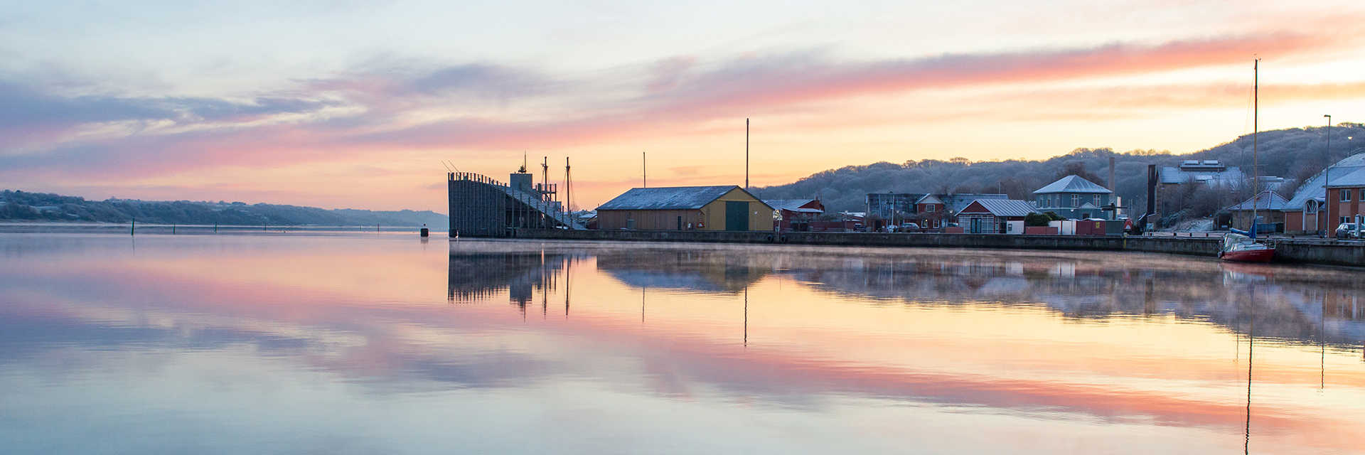 Foto af solopgang fra Hobro Havn